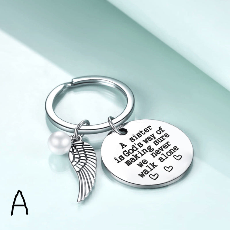 A Sister is God's Way of Making Sure We Never Walk Alone Keychain